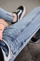 Calça jeans longa moda masculina desfiada slim fit