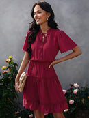 Vestido feminino solto com babados gola alta