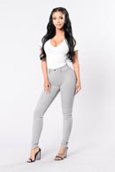 Jeans skinny de cintura alta feminino