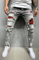 Calça jeans slim rasgada moda masculina cintura média