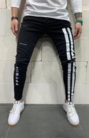 Calça jeans longa moda masculina desfiada slim fit