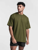 Camiseta masculina tamanho grande essencial de cor sólida
