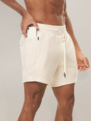 Shorts de corrida masculinos de cor sólida que absorvem o suor