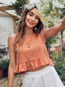 Blusa feminina sem mangas com bainha em folha de lótus e gola redonda em cor pura