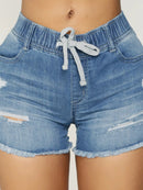 Shorts jeans rasgados com cordão feminino