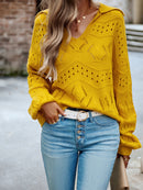 Top feminino de malha com gola POLO e manga comprida